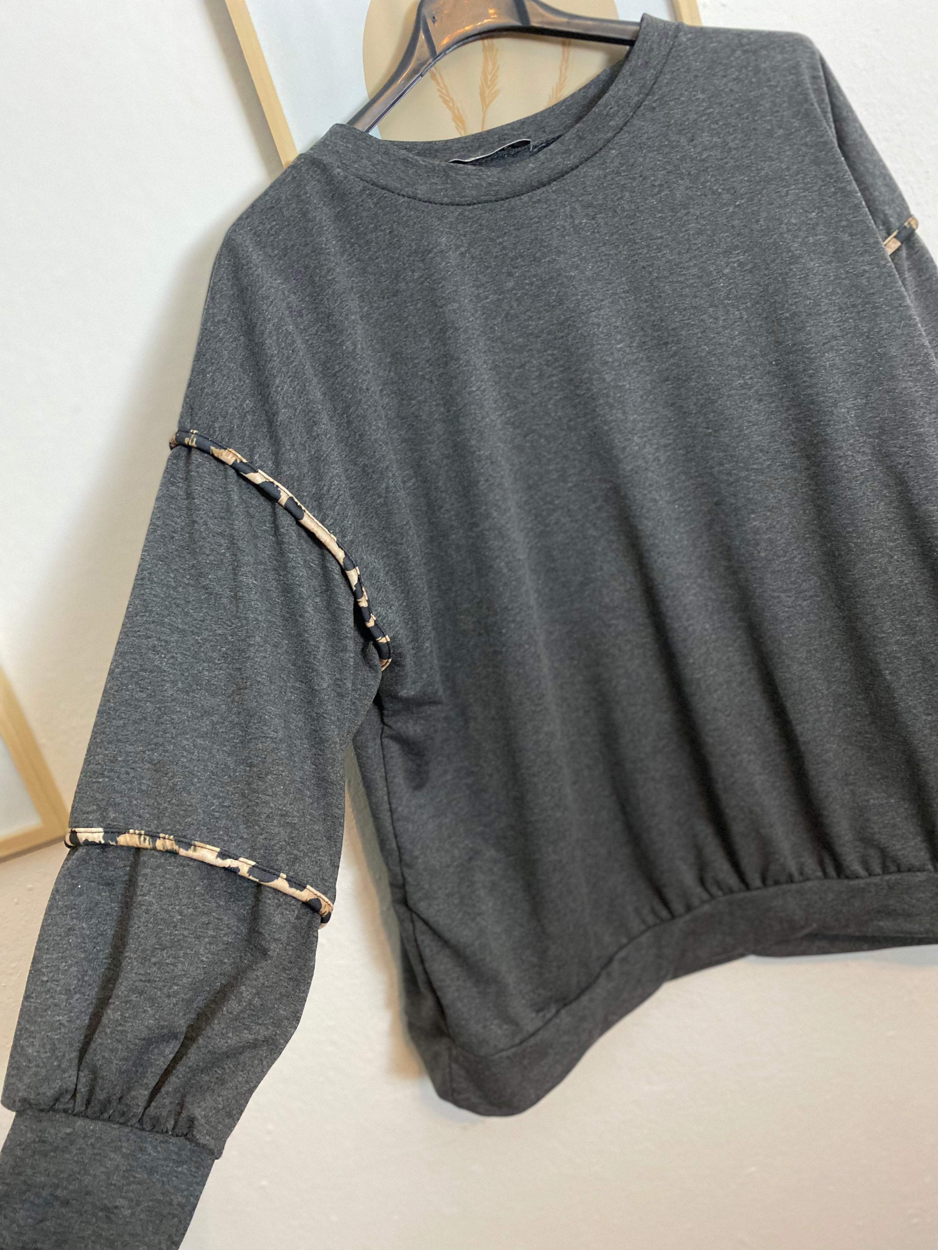 Felpa dettagli maculati