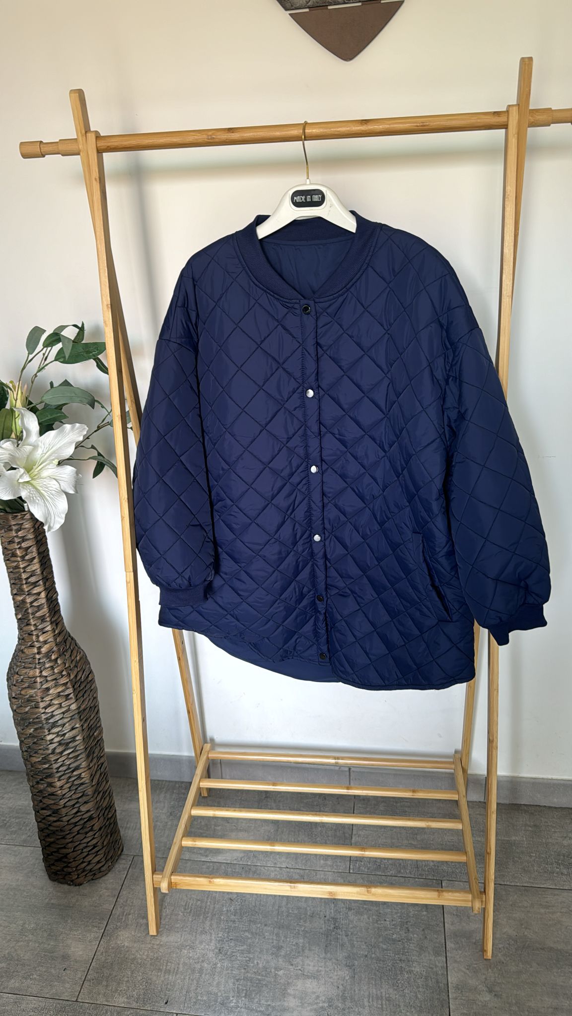 Piumino trapuntato con bottoni