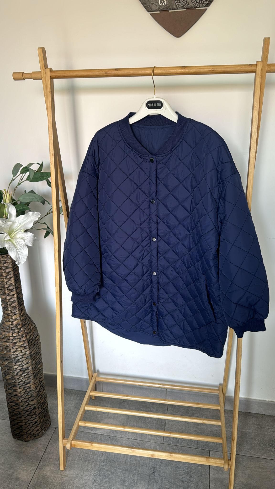 Piumino trapuntato con bottoni