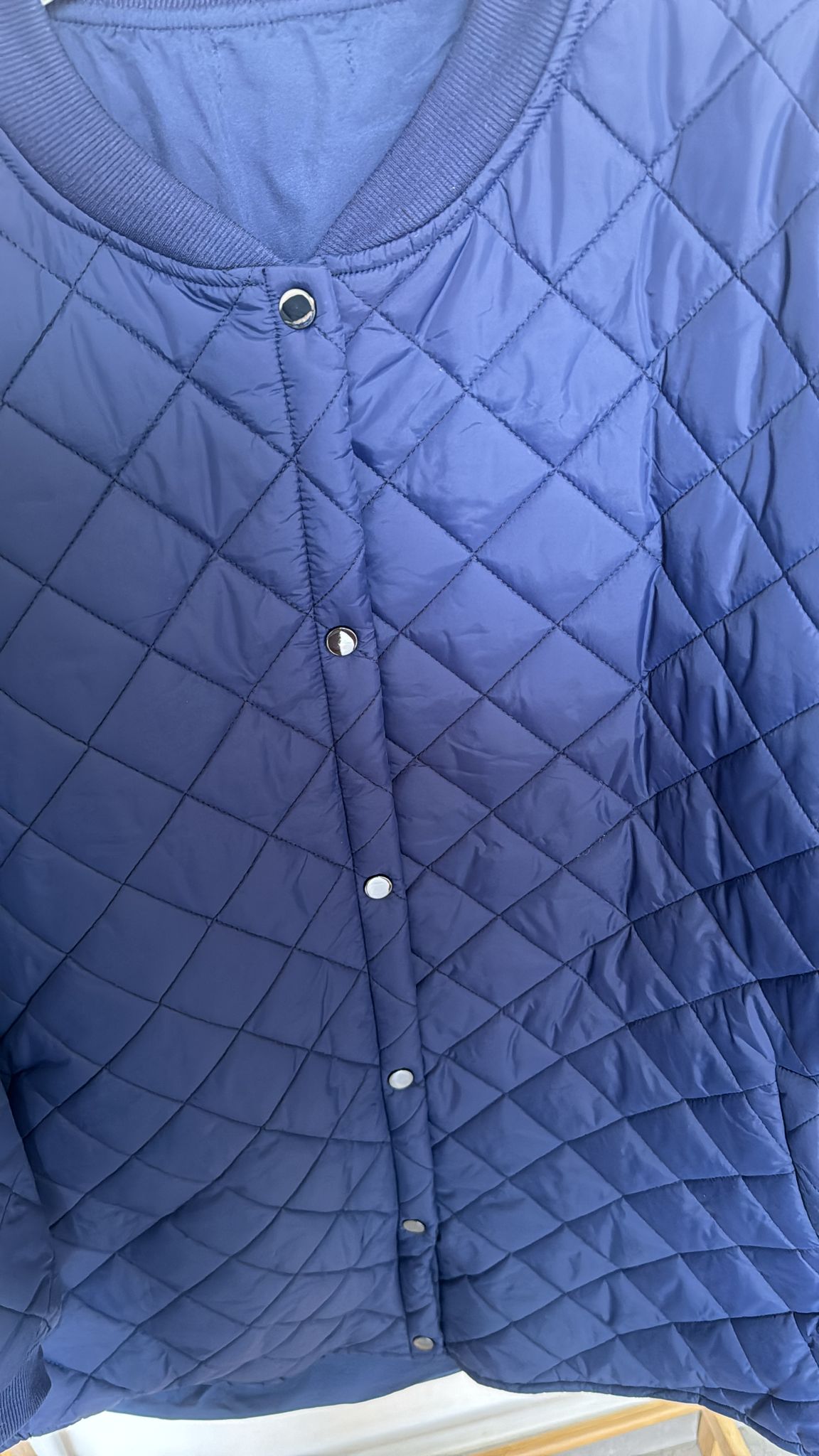 Piumino trapuntato con bottoni