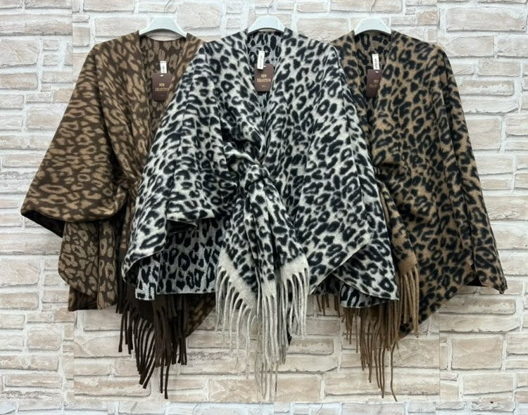 Mantella fantasia con frange curvy